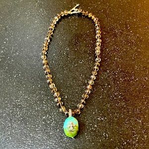 Genuine Smokey quartz and turquoise pendant with diamond accents on pendant.